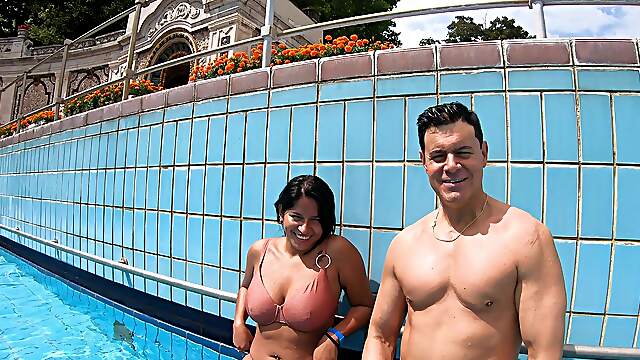 Amy Amor bouncing big natural tits by the pool