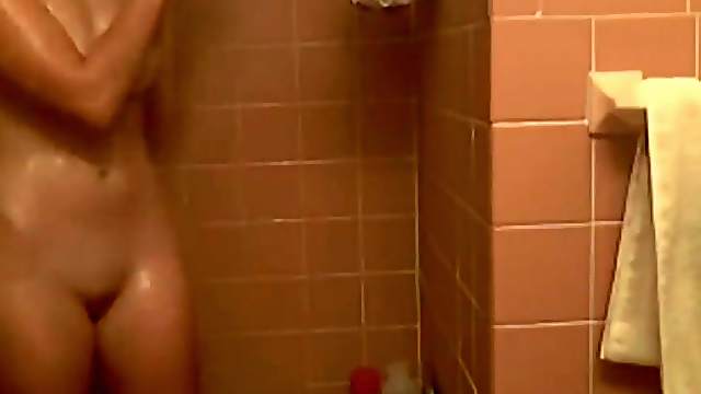 Big tits girl in pink panties takes a shower