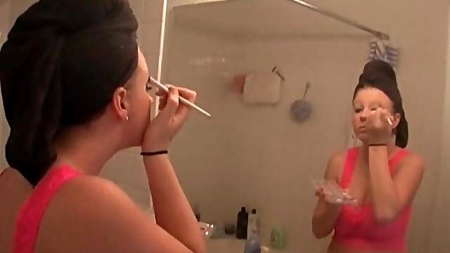 Big tits teen in hot pink lingerie does her makeup