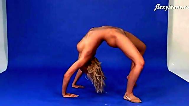 Naked girl dances and bends splendidly