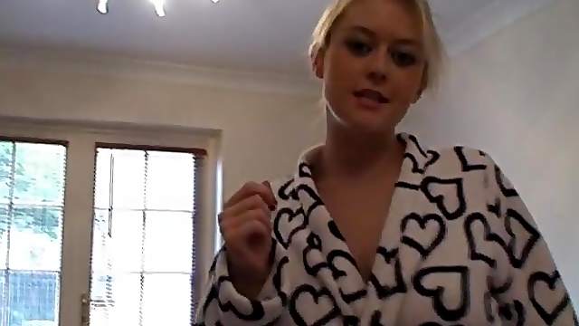 Babe in her bathrobe teasing her lovely big natural tits
